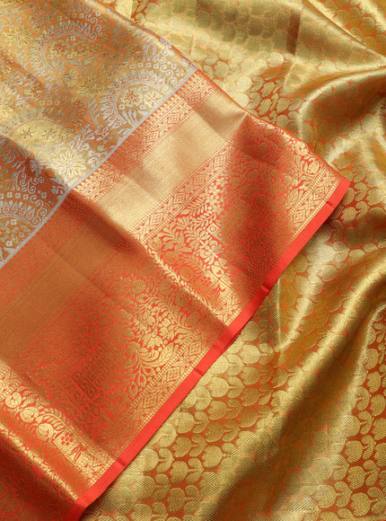Pure kanchipuram tissue silk saree orange with allover zari woven brocade weaves and rich zari woven border