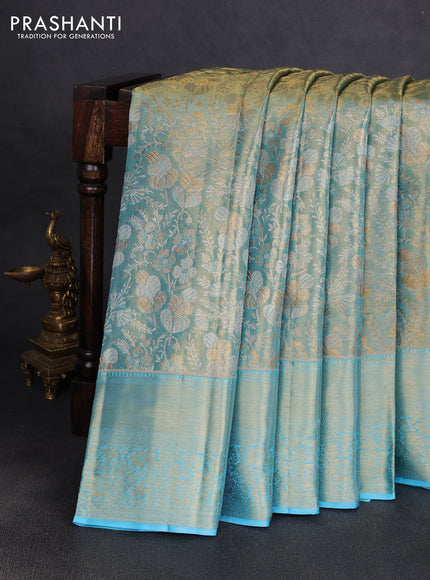 Pure kanchipuram tissue silk saree light blue with allover zari woven brocade weaves and rich zari woven border