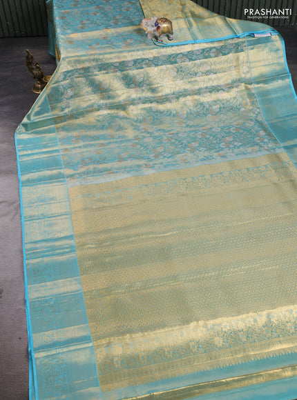 Pure kanchipuram tissue silk saree light blue with allover zari woven brocade weaves and rich zari woven border