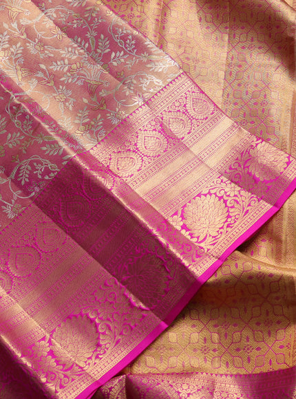Pure kanchipuram tissue silk saree golden pink and magenta pink with allover zari woven brocade weaves and long rich zari woven floral border
