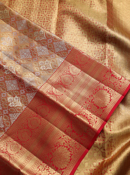 Pure kanchipuram tissue silk saree gold and red with allover zari woven brocade weaves and long rich zari woven floral border