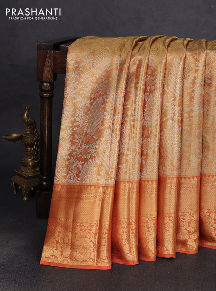Pure kanchipuram tissue silk saree golden rust shade with allover zari woven brocade weaves and rich zari woven border