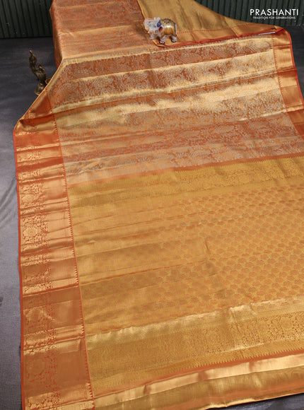 Pure kanchipuram tissue silk saree golden rust shade with allover zari woven brocade weaves and rich zari woven border