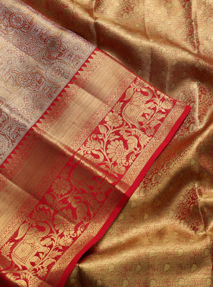 Pure kanchipuram tissue silk saree golden red and red with allover zari woven brocade weaves and rich zari woven border