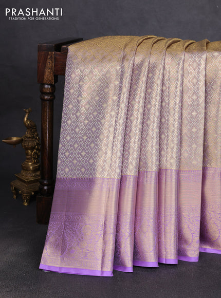 Pure kanchipuram tissue silk saree mild lavender and lavender with allover zari woven brocade weaves and long rich zari woven border