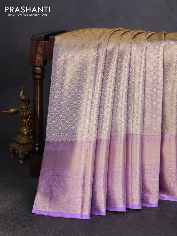Pure kanchipuram tissue silk saree mild lavender and lavender with allover zari woven brocade weaves and long rich zari woven border