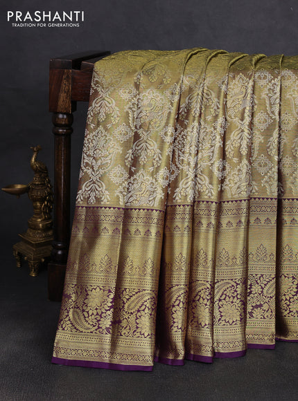 Pure kanchipuram tissue silk saree gold and purple with allover zari woven brocade weaves and long rich zari woven border