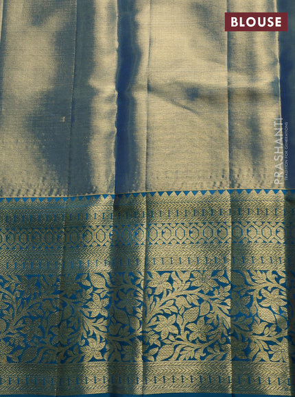 Pure kanchipuram tissue silk saree dual shade of golden blue and peacock green with allover zari woven brocade weaves and rich zari woven border