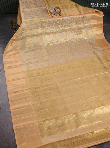 Pure kanchipuram tissue silk saree gold and pale orange with allover zari woven brocade weaves and rich zari woven border