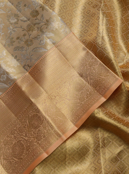 Pure kanchipuram tissue silk saree gold and pale orange with allover zari woven brocade weaves and rich zari woven border