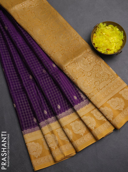 Semi mysore silk saree violet and dark mustard with allover small zari checks & buttas and floral zari woven border