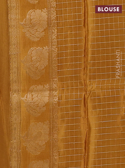 Semi mysore silk saree violet and dark mustard with allover small zari checks & buttas and floral zari woven border