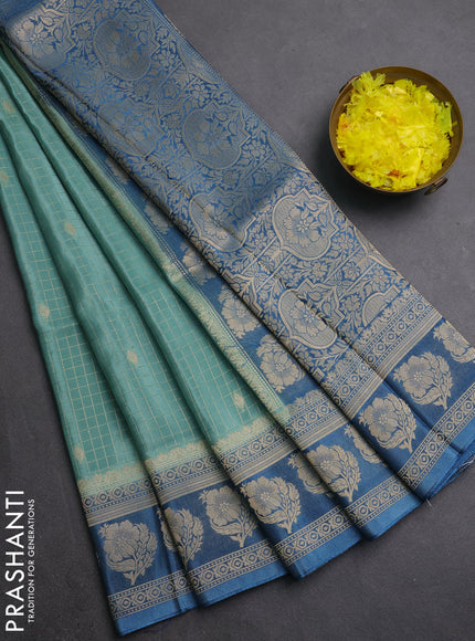 Semi mysore silk saree pastel blue shade and blue with allover small zari checks & buttas and floral zari woven border