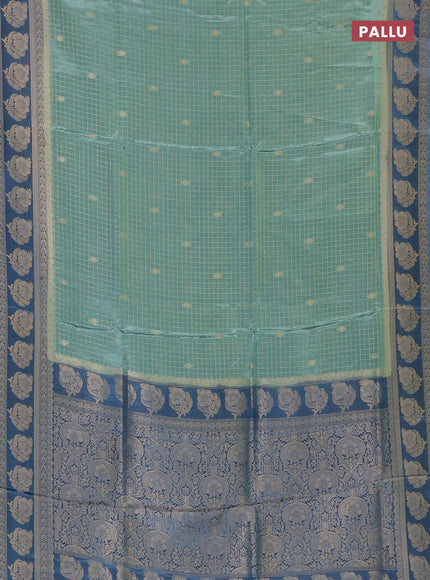 Semi mysore silk saree pastel blue shade and blue with allover small zari checks & buttas and floral zari woven border
