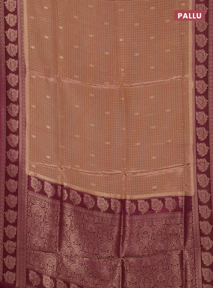 Semi mysore silk saree sandal and wine shade with allover small zari checks & buttas and floral zari woven border