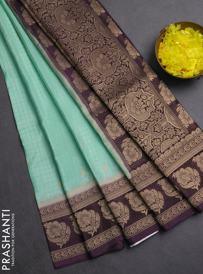 Semi mysore silk saree teal green and jamun shade with allover small zari checks & buttas and floral zari woven border