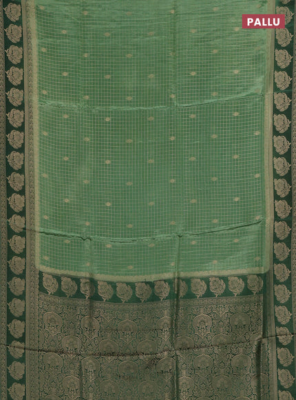 Semi mysore silk saree pastel green and green with allover small zari checks & buttas and floral zari woven border