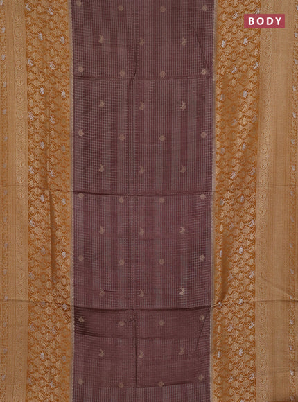 Semi mysore silk saree pastel brown and yellow with allover small zari checks & buttas and long zari woven border