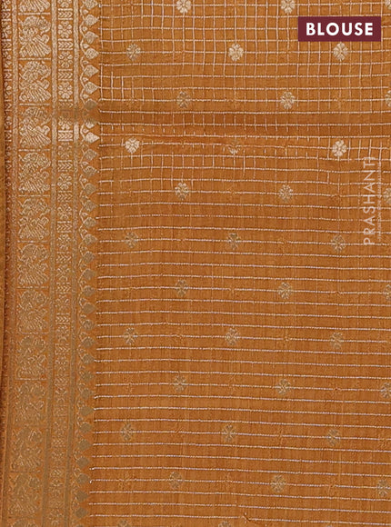Semi mysore silk saree pastel brown and yellow with allover small zari checks & buttas and long zari woven border
