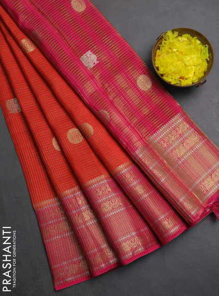 Semi mysore silk saree orange and pink with allover small zari checks & buttas and long zari woven border