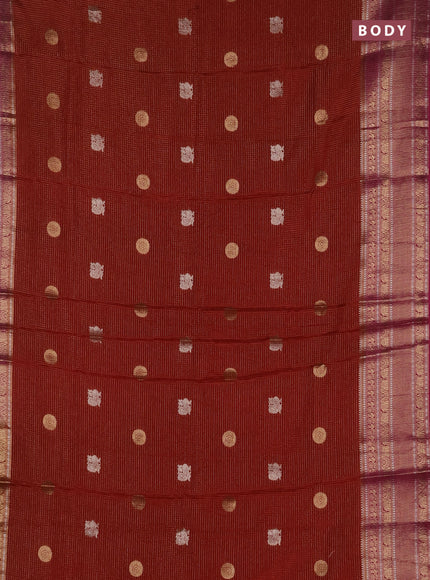 Semi mysore silk saree rustic orange and pink with allover small zari checks & buttas and long zari woven border