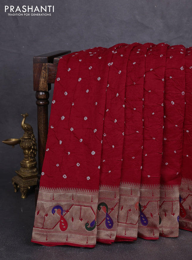 Dola silk saree red with allover bandhani prints and paithani border