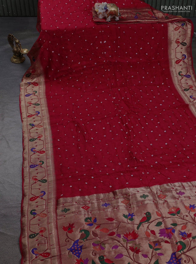 Dola silk saree red with allover bandhani prints and paithani border