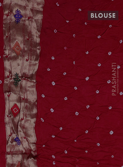 Dola silk saree red with allover bandhani prints and paithani border