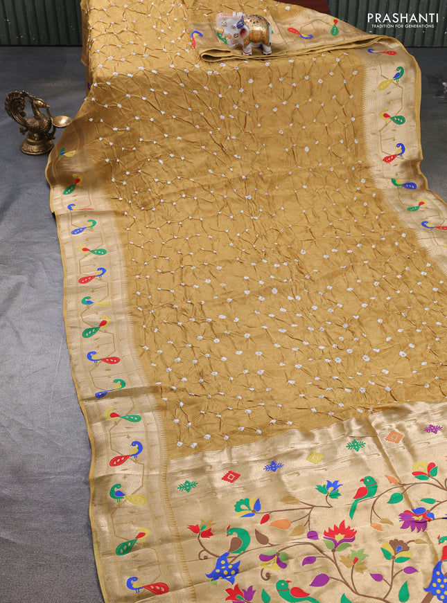 Dola silk saree mustard yellow with allover bandhani prints and paithani border