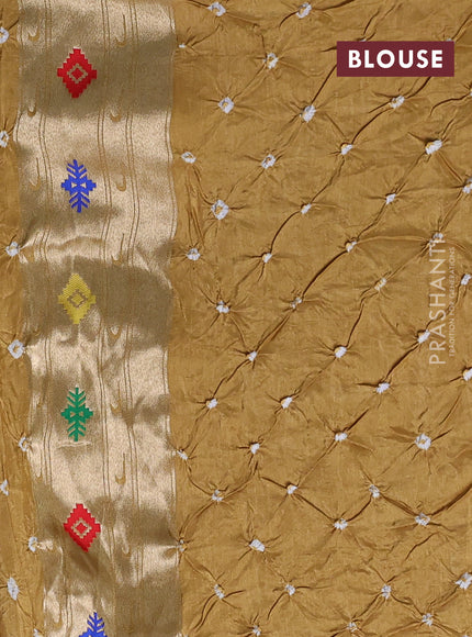 Dola silk saree mustard yellow with allover bandhani prints and paithani border