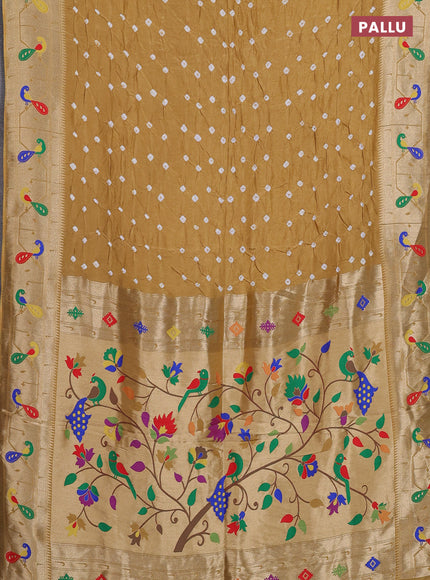 Dola silk saree mustard yellow with allover bandhani prints and paithani border