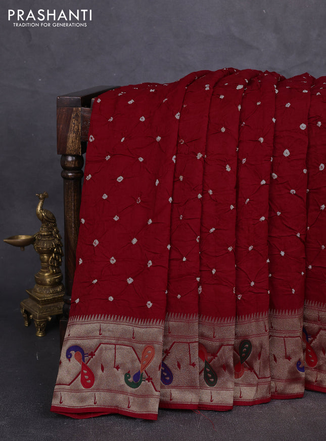 Dola silk saree red with allover bandhani prints and paithani border