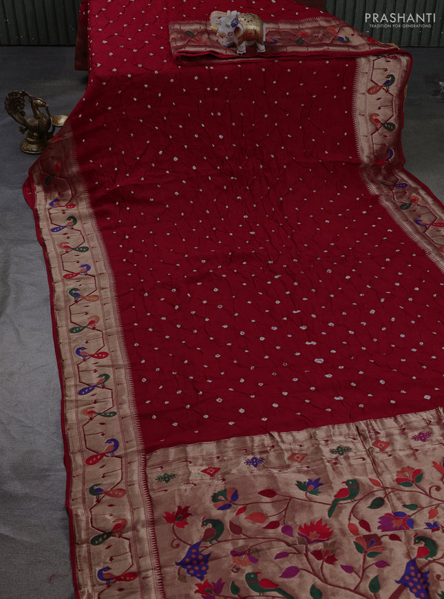 Dola silk saree red with allover bandhani prints and paithani border