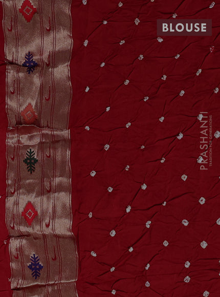 Dola silk saree red with allover bandhani prints and paithani border