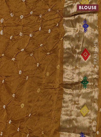 Dola silk saree dark mustard yellow with allover bandhani prints and paithani border