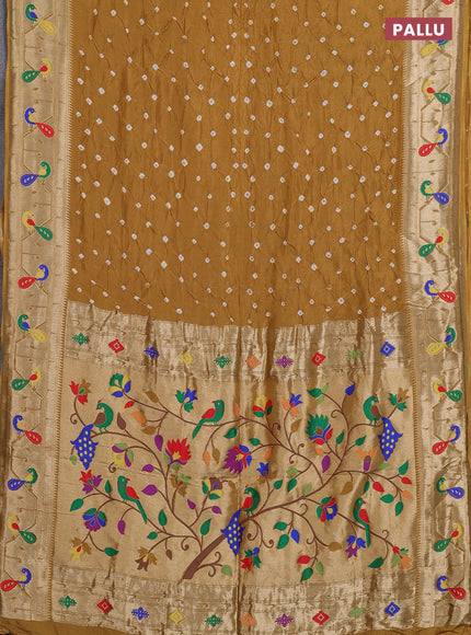 Dola silk saree dark mustard yellow with allover bandhani prints and paithani border