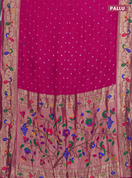 Dola silk saree pink with allover bandhani prints and paithani border