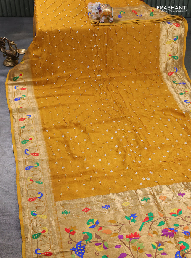 Dola silk saree mustard yellow with allover bandhani prints and paithani border
