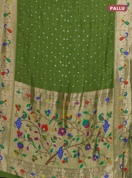 Dola silk saree light green with allover bandhani prints and paithani border