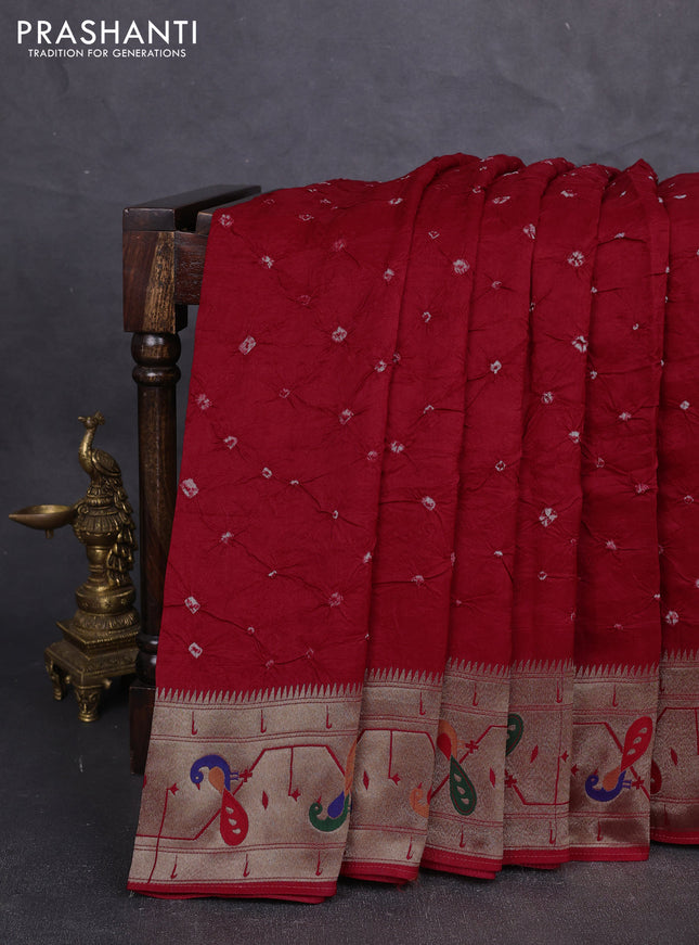 Dola silk saree red with allover bandhani prints and paithani border