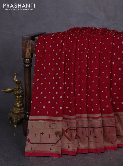 Dola silk saree red with allover bandhani prints and paithani border
