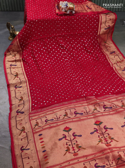 Dola silk saree red with allover bandhani prints and paithani border