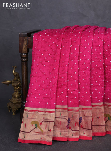 Dola silk saree pink and red with allover bandhani prints and paithani border