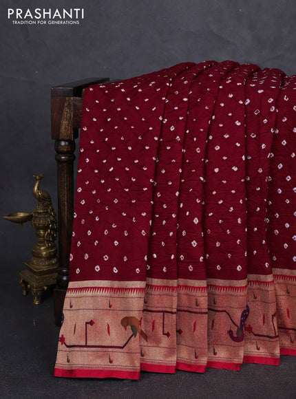 Dola silk saree maroon and red with allover bandhani prints and paithani border
