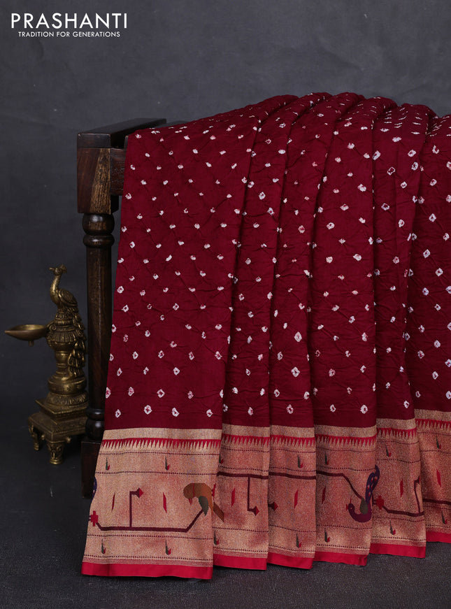 Dola silk saree maroon and red with allover bandhani prints and paithani border