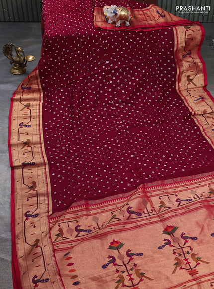 Dola silk saree maroon and red with allover bandhani prints and paithani border