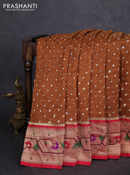 Dola silk saree dark mustard and red with allover bandhani prints and paithani border