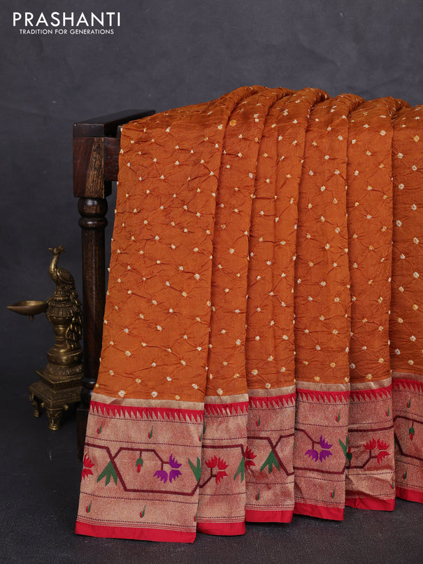 Dola silk saree dark mustard yellow and red with allover bandhani prints and paithani border