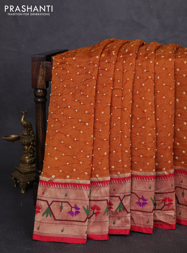 Dola silk saree dark mustard yellow and red with allover bandhani prints and paithani border