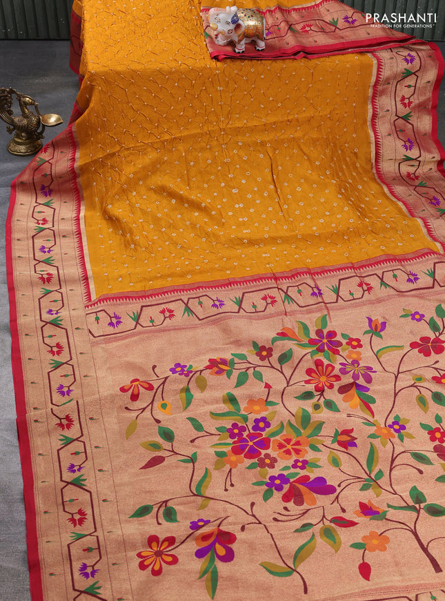 Dola silk saree mustard yellow and red with allover bandhani prints and paithani border